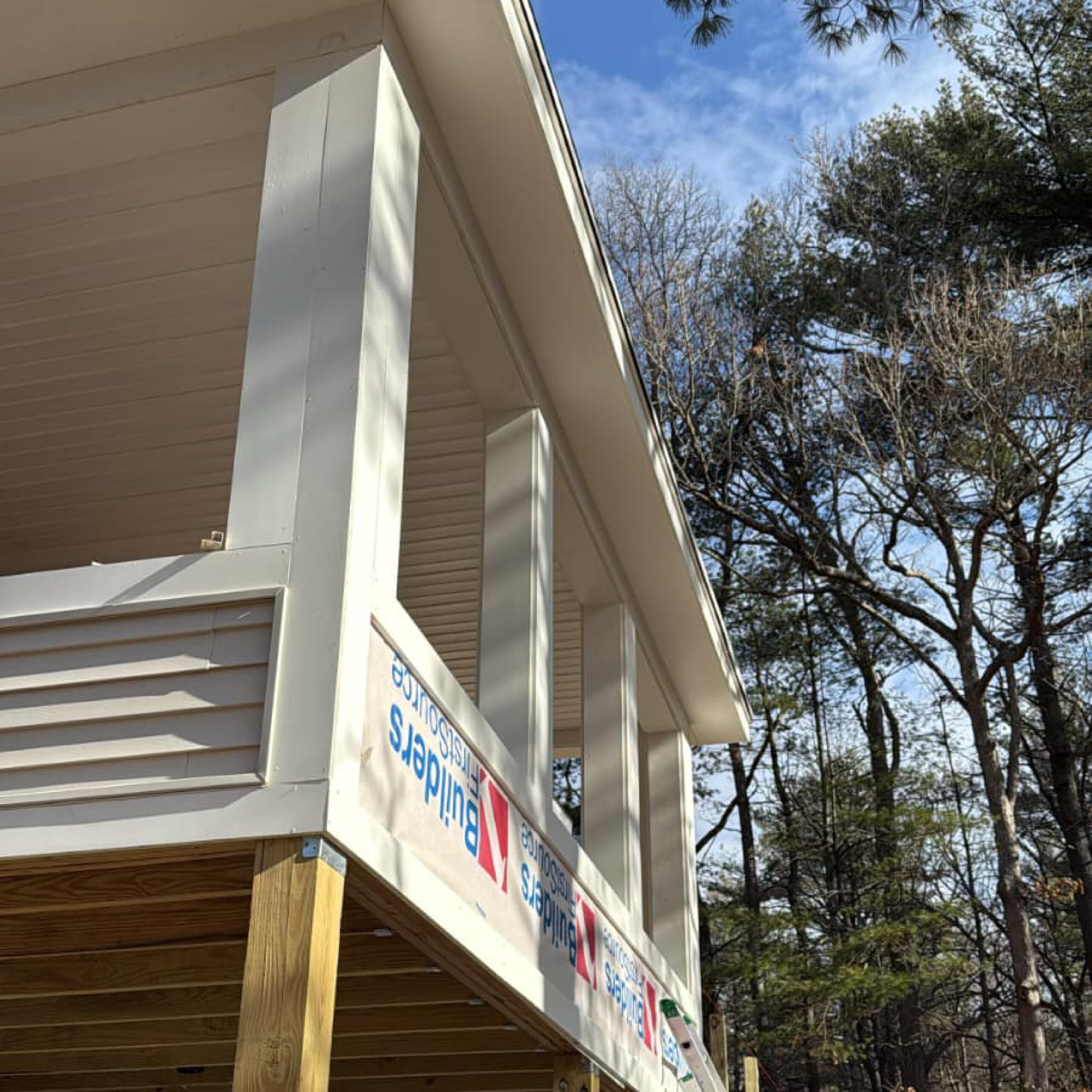 Exterior architectural porch detail by Family Realty Holdings