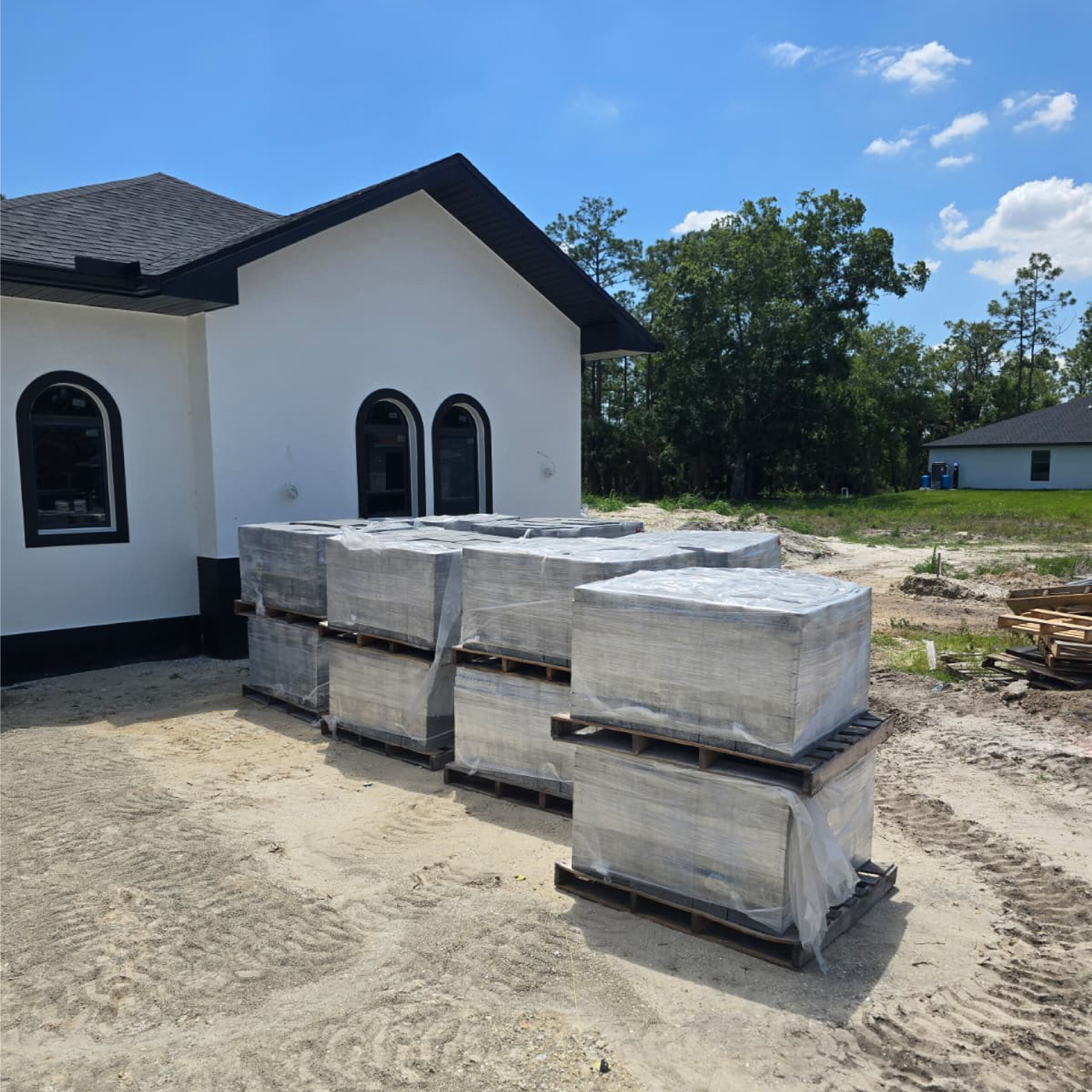 Family Realty Holdings Plumosa House under construction showcasing masonry work and residential development progress